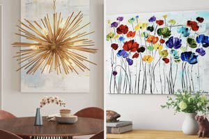A starburst chandelier above a table and a floral painting hung on a wall