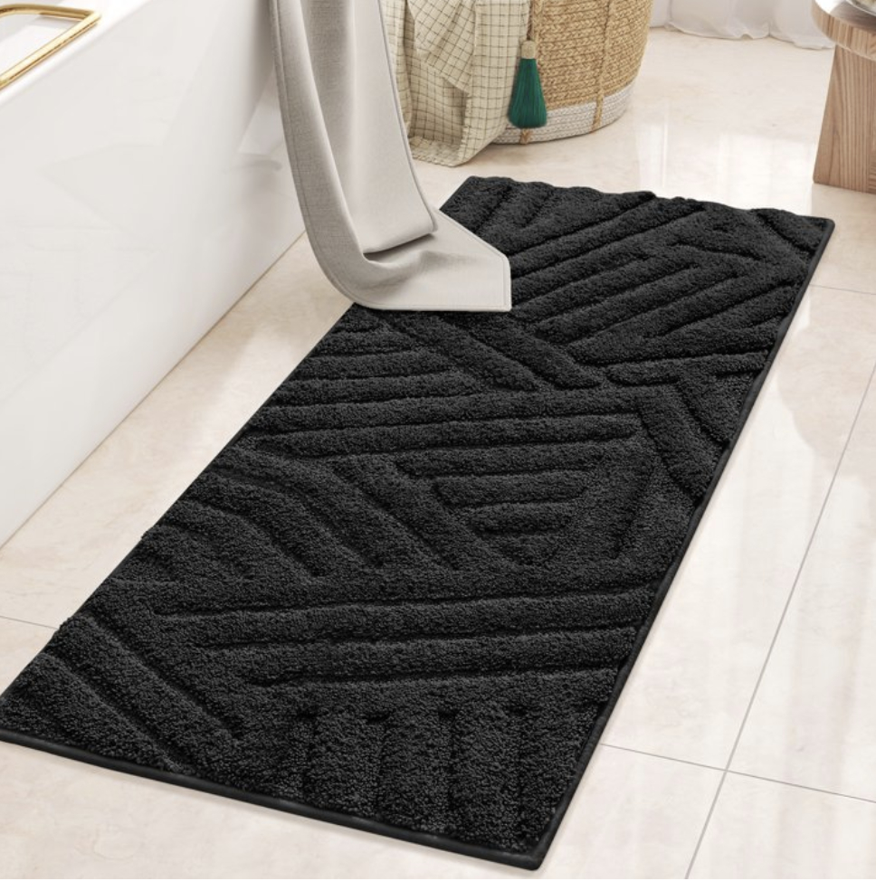 Long textured bath mat displayed on a bathroom floor