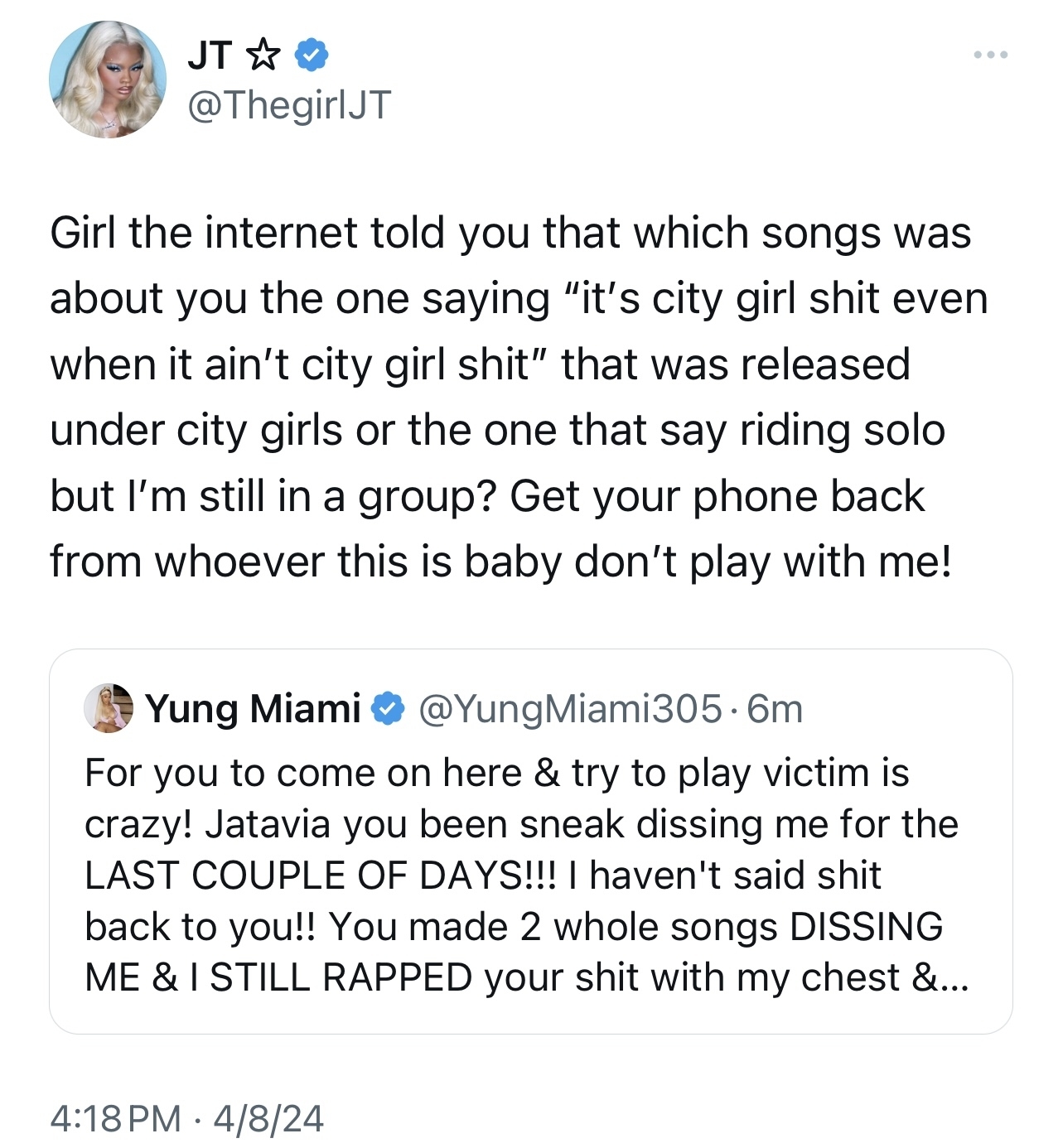 Tweet exchange between @ThegirlJT and @YungMiami305 discussing their music and a rumor, showing a strong bond despite controversy
