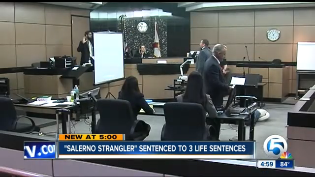 Several people in a courtroom with one person, labeled as the &quot;Salerno Strangler,&quot; sentenced to three life terms
