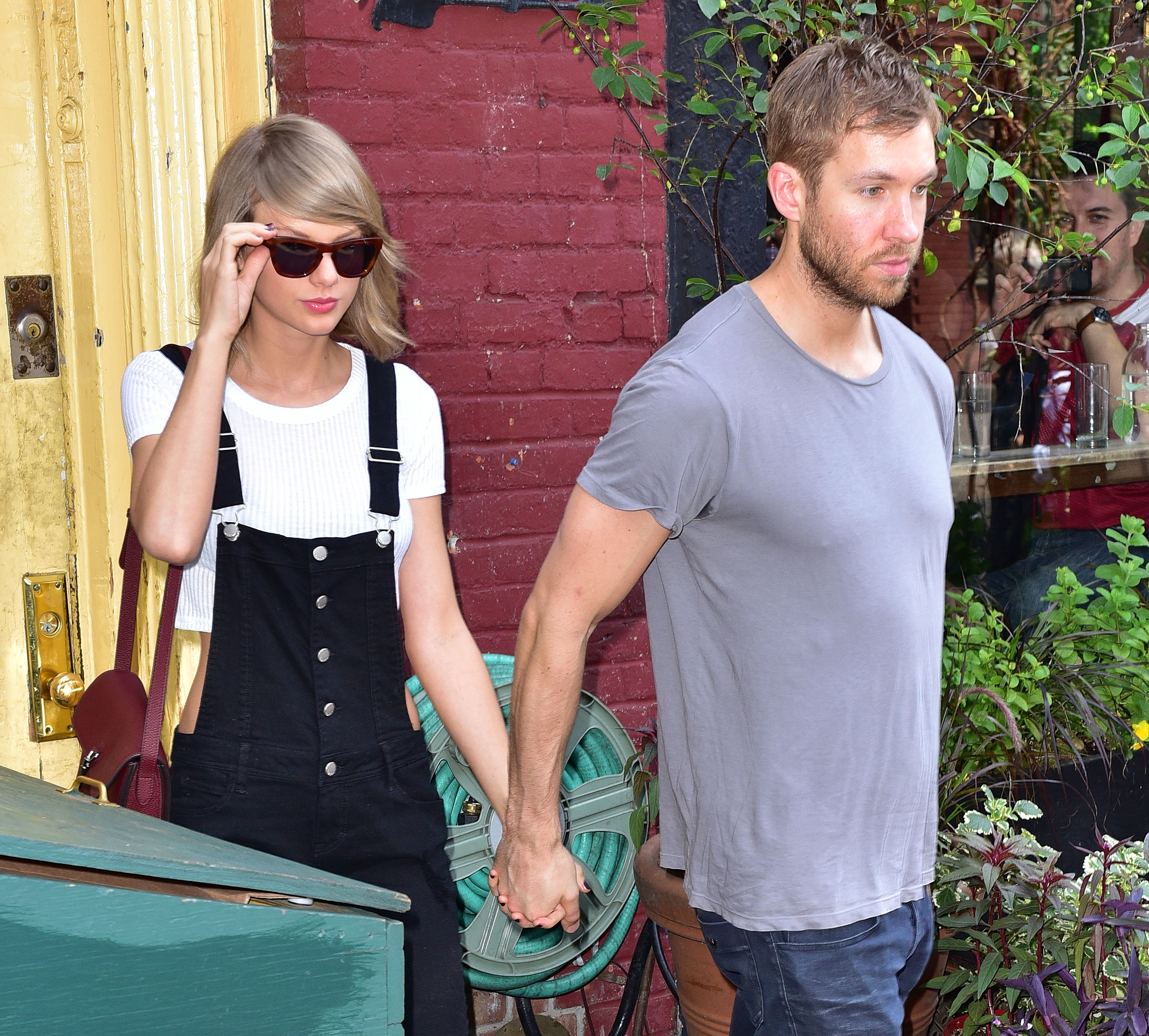 Taylor Swift and Calvin Harris leave the Spotted Pig restaurant on May 28, 2015 in New York City