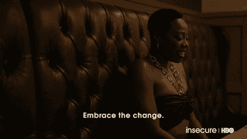 Person on sofa with subtitle &quot;Embrace the change&quot; from HBO's Insecure
