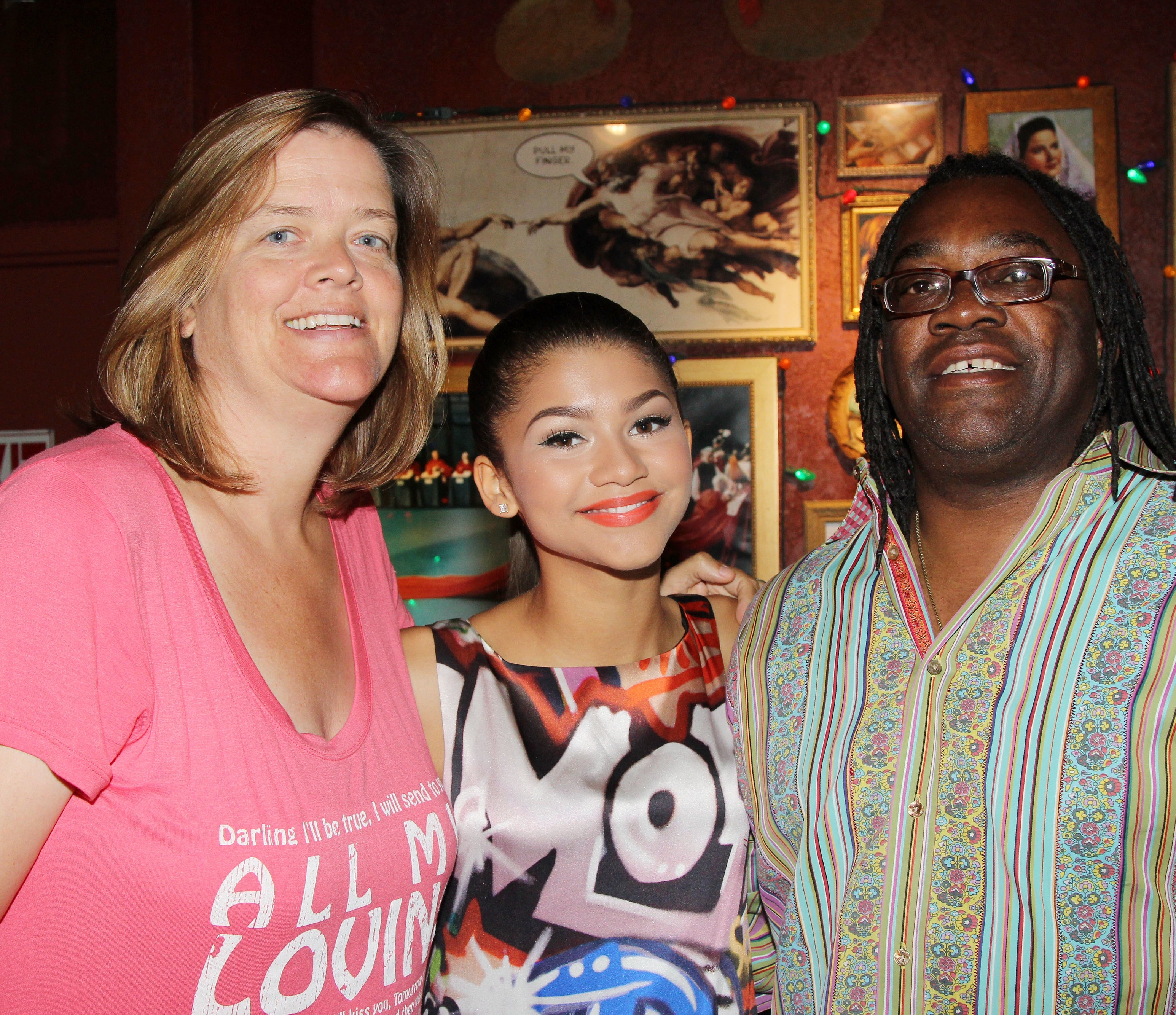 Zendaya with her mother and father