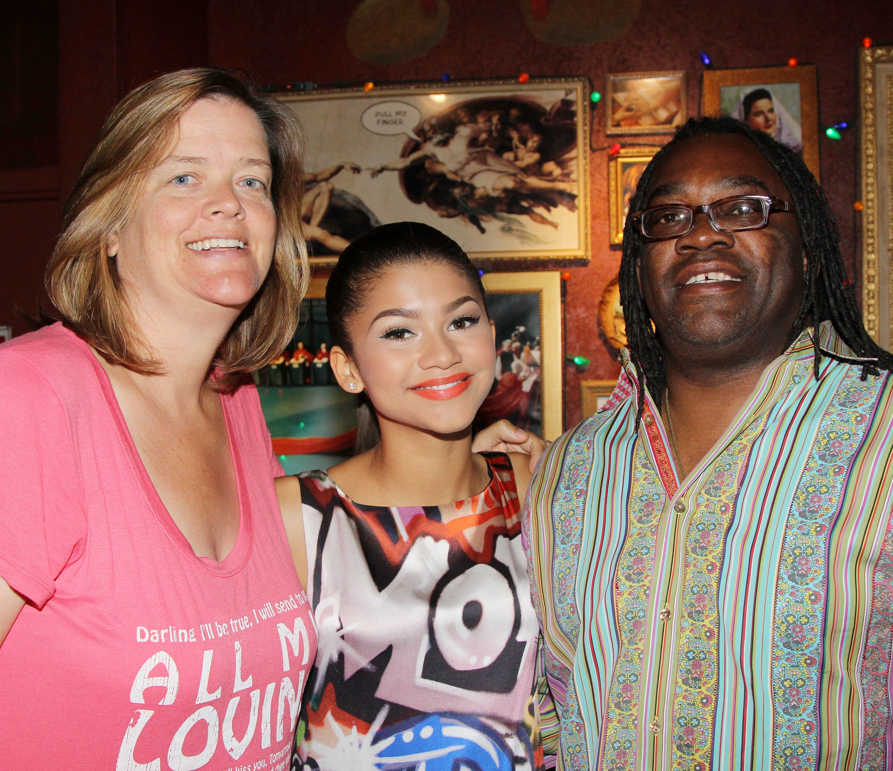 Zendaya with her mother and father