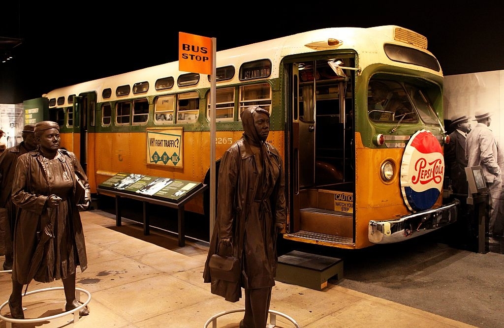Historical Rosa Parks bus display with life-size figures and information plaques