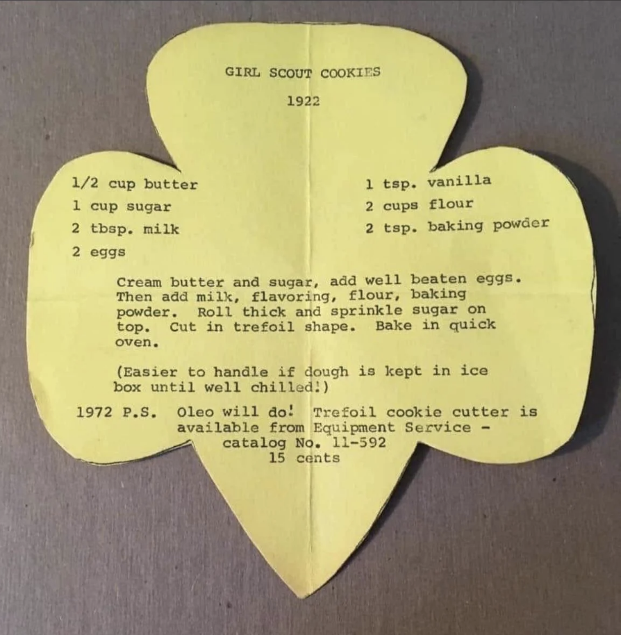 Recipe for Girl Scout cookies on a trefoil-shaped paper, includes butter, sugar, vanilla, flour, among other ingredients