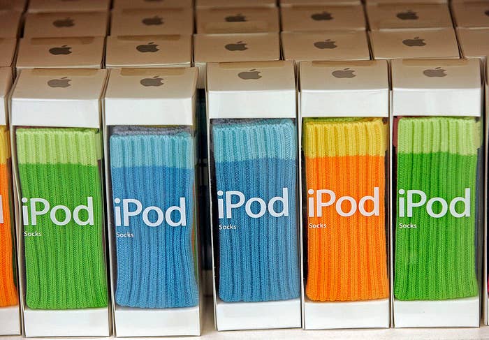 Rows of iPod Socks packaging with assorted bright colors on a store shelf
