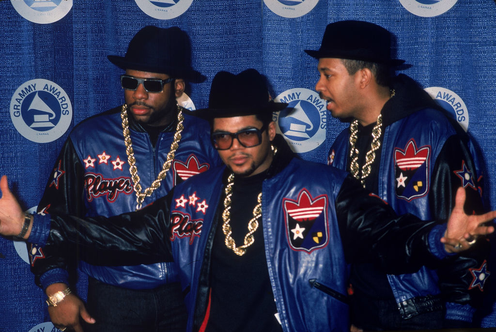 Run DMC at the Grammy Awards wearing matching jackets with star details and heavy gold chains