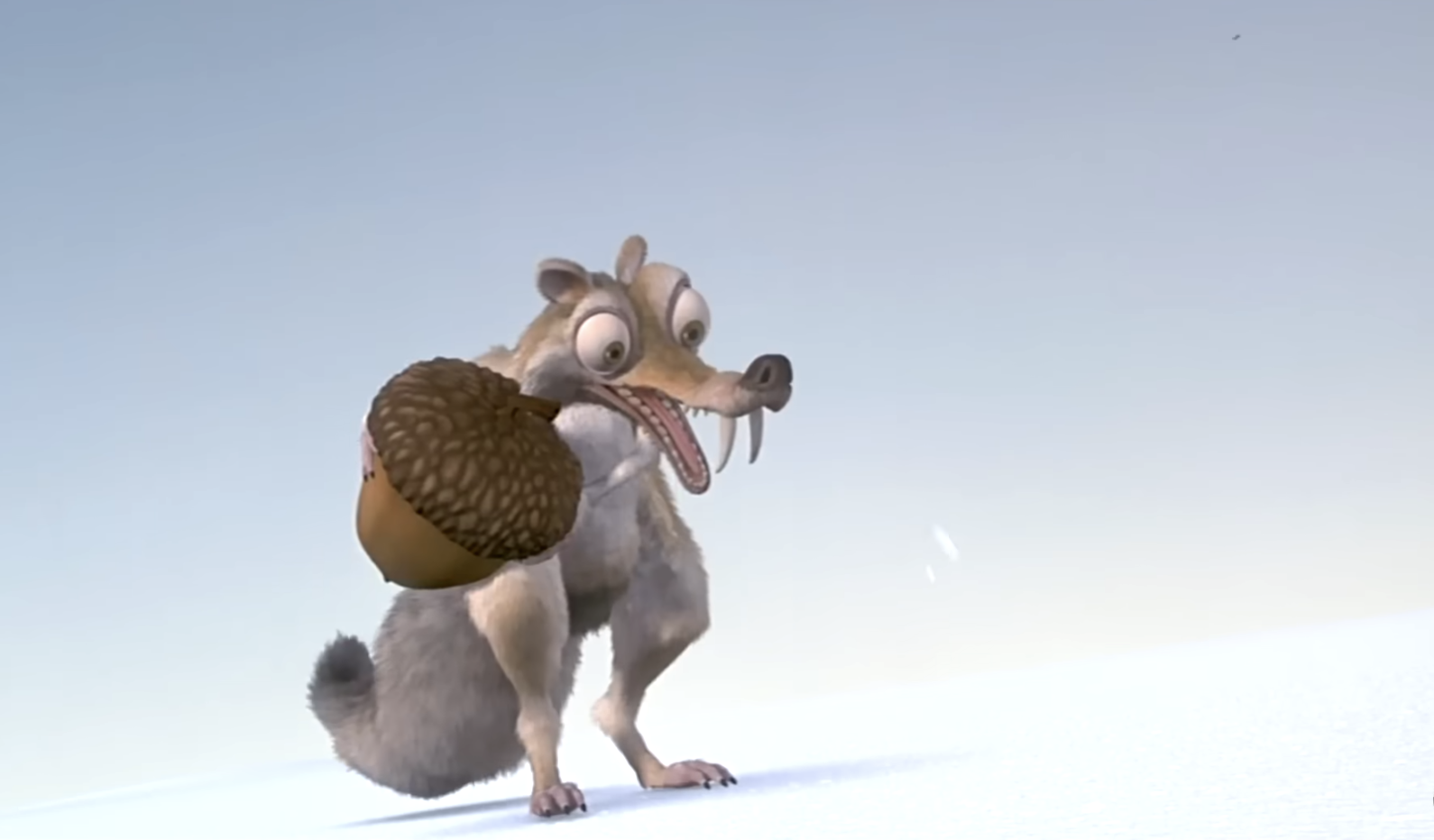 Scrat from Ice Age clutching an acorn with a surprised expression