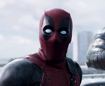 Deadpool in costume with a raised eyebrow expression