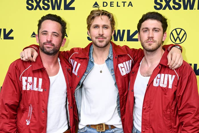 Ryan Gosling posing with his stunt doubles
