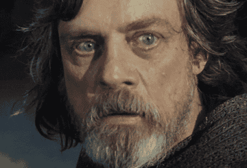 Luke Skywalker looks at Rey