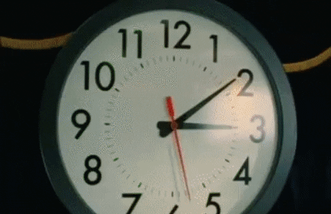 Animated clock with fast-moving hands indicating the passage of time