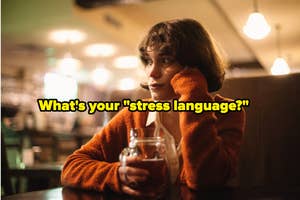 Woman in orange sweater at cafe with text "What's your 'stress language'?"