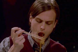 Matthew Gray Gubler attempting to eat with chopsticks as Spencer Reid on Criminal Minds