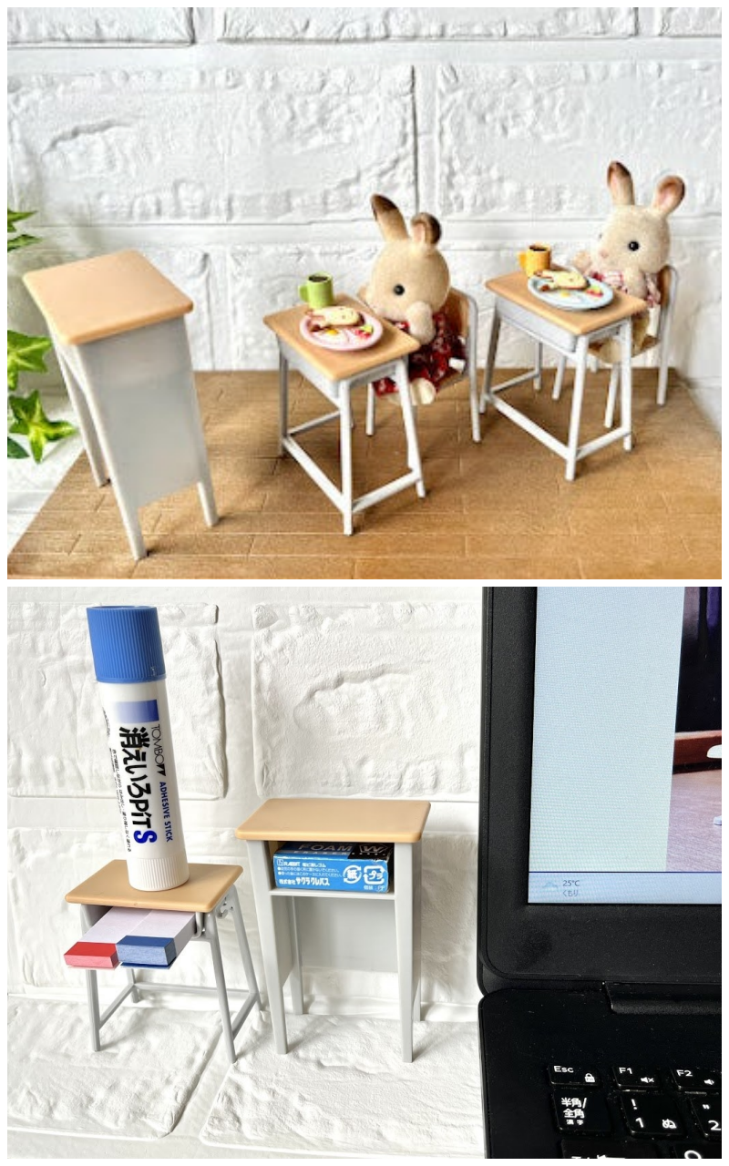 シルバニアファミリーのおもちゃのウサギ二匹がテーブルでお食事している様子。