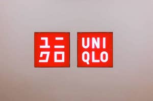 Two framed Uniqlo brand logos displayed on a wall