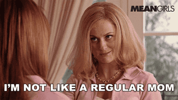 Regina's mom from "Mean Girls" with a sly smile in a pink sweater, text: "i'm not like a regular mom i'm a cool mom"