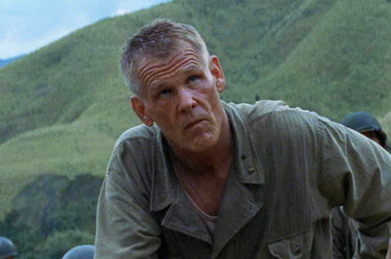 Man in military uniform looking puzzled or concerned