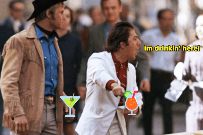 Scene from &quot;Midnight Cowboy&quot; with characters Joe Buck and Ratso Rizzo, with added text and clipart of drinks saying &quot;im drinkin&#x27; here!&quot;
