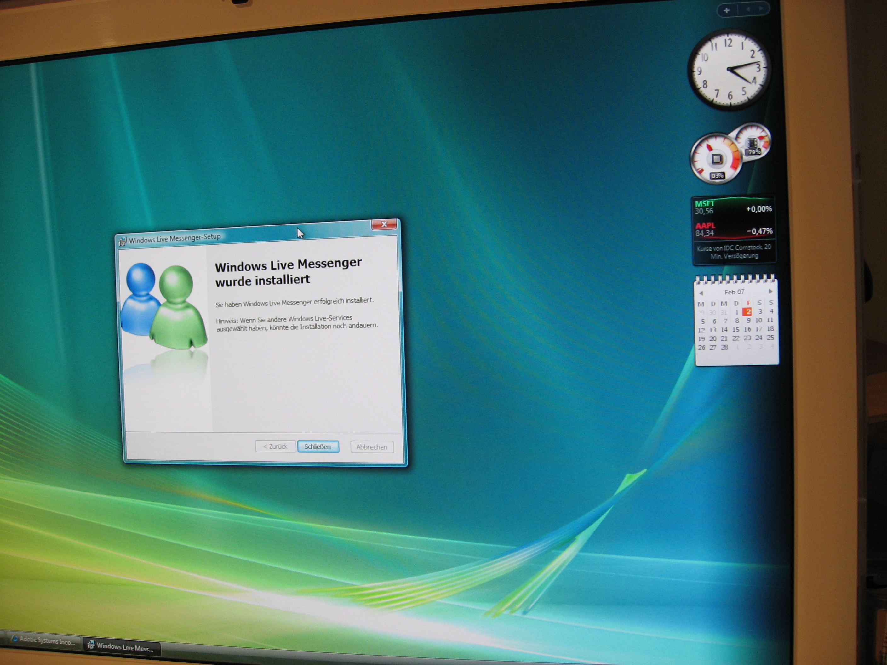 Windows Live Messenger installation prompt on a computer screen with desktop widgets visible