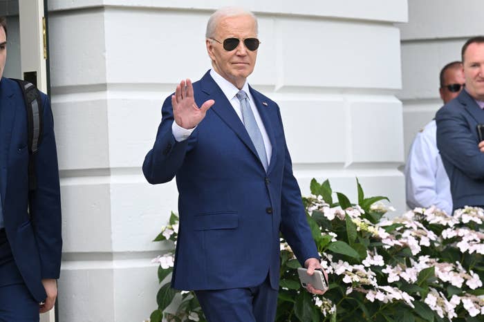 A closeup of Joe Biden waving