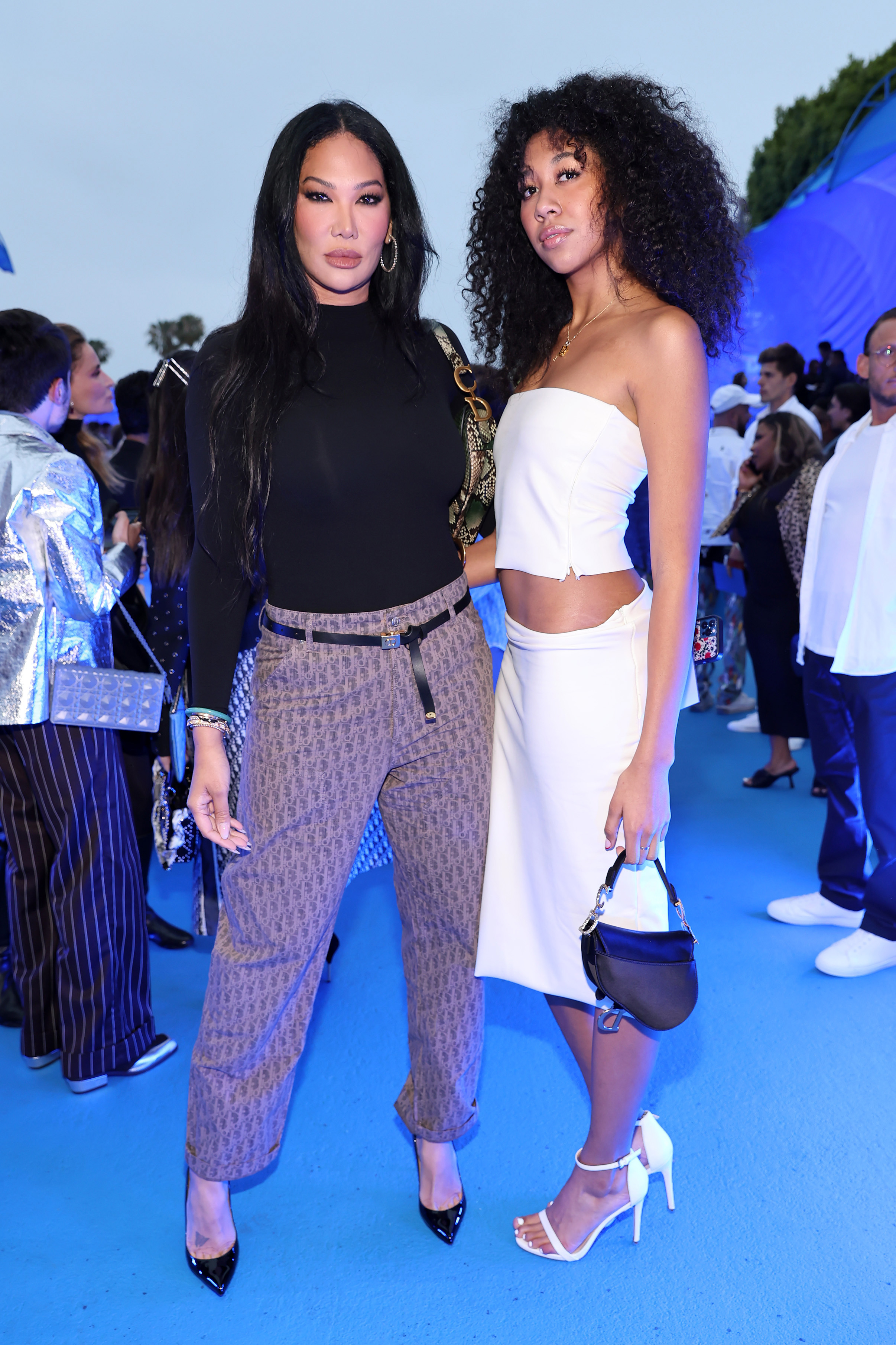 Kimora and Aoki posing for the cameras at an event