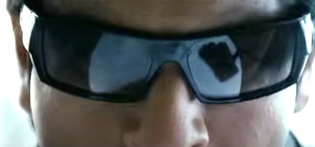 Close-up of a character wearing futuristic sunglasses
