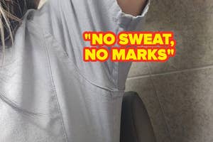 reviewer displaying underarm in shirt to reveal no sweat marks or stains