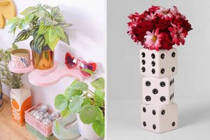 Vase shaped like stacked dice beside houseplants; enhances home decor. Ideal for shoppers seeking unique interior pieces