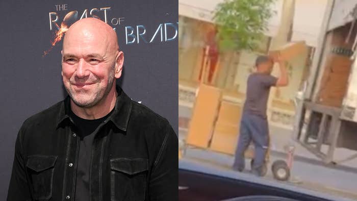 Man in a black shirt on a backdrop for &#x27;The Roast of Brad,&#x27; and another man loading a hand truck on the street