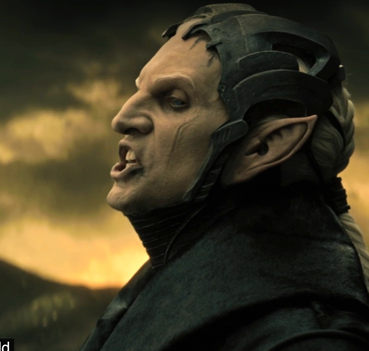 Chris as Malekith pointed ears and a helmet in a dramatic expression