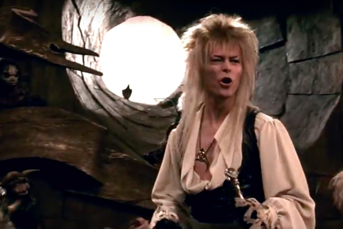 Jareth the Goblin King, portrayed by David Bowie, in &#x27;Labyrinth&#x27;, wearing a white ruffled shirt and leather vest
