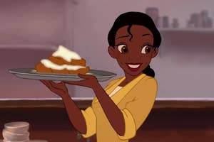 Tiana from The Princess and the Frog holding a plate with a piece of pie