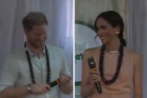 Prince Harry and Meghan Markle wearing casual attire with bead necklaces, Meghan holding a microphone