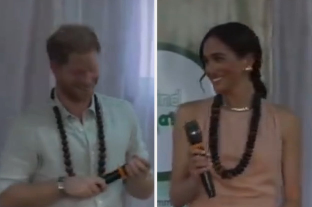 Prince Harry and Meghan Markle wearing casual attire with bead necklaces, Meghan holding a microphone