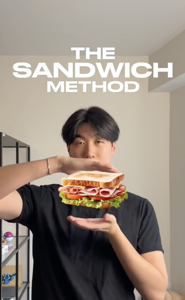 Person demonstrating &#x27;The Sandwich Method&#x27; by holding hands apart as if holding a sandwich