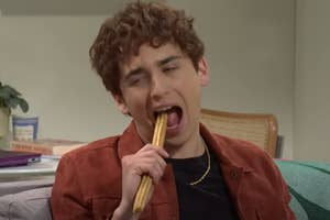 Marcello Hernandez eating a churro in an SNL sketch