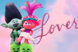 Branch and Poppy from "Trolls" standing together, Poppy wearing a dress with a fluffy skirt overlaid on the "Lover" album cover.