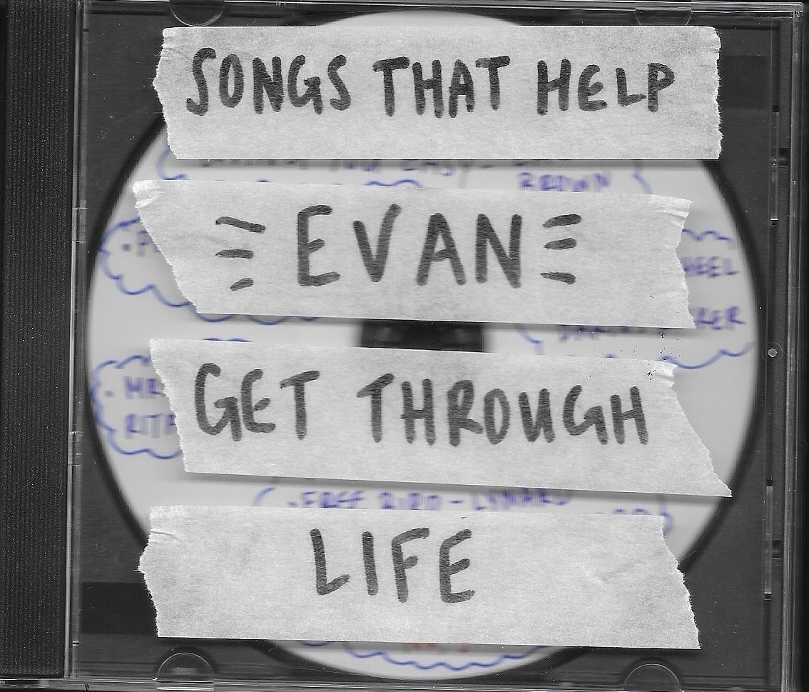 CD case with handwritten notes titled "SONGS THAT HELP EVAN GET THROUGH LIFE"