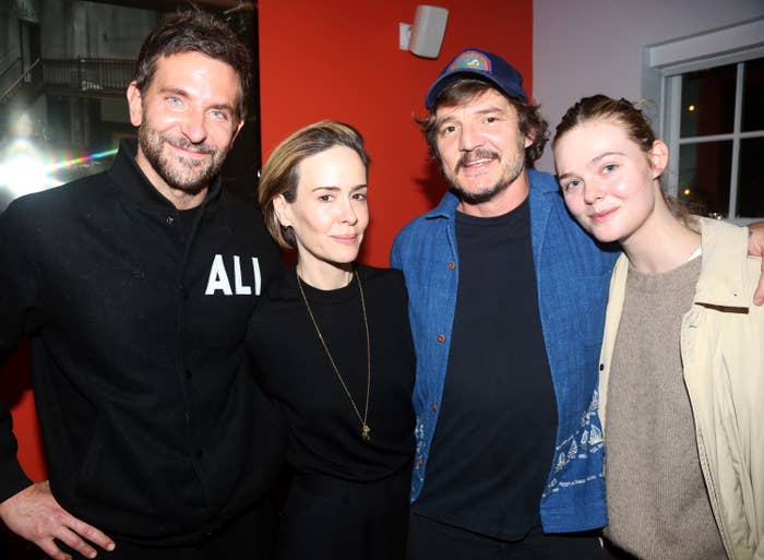 Bradley Cooper, Sarah Paulson, Pedro Pascal, and Elle Fanning posing for a photo