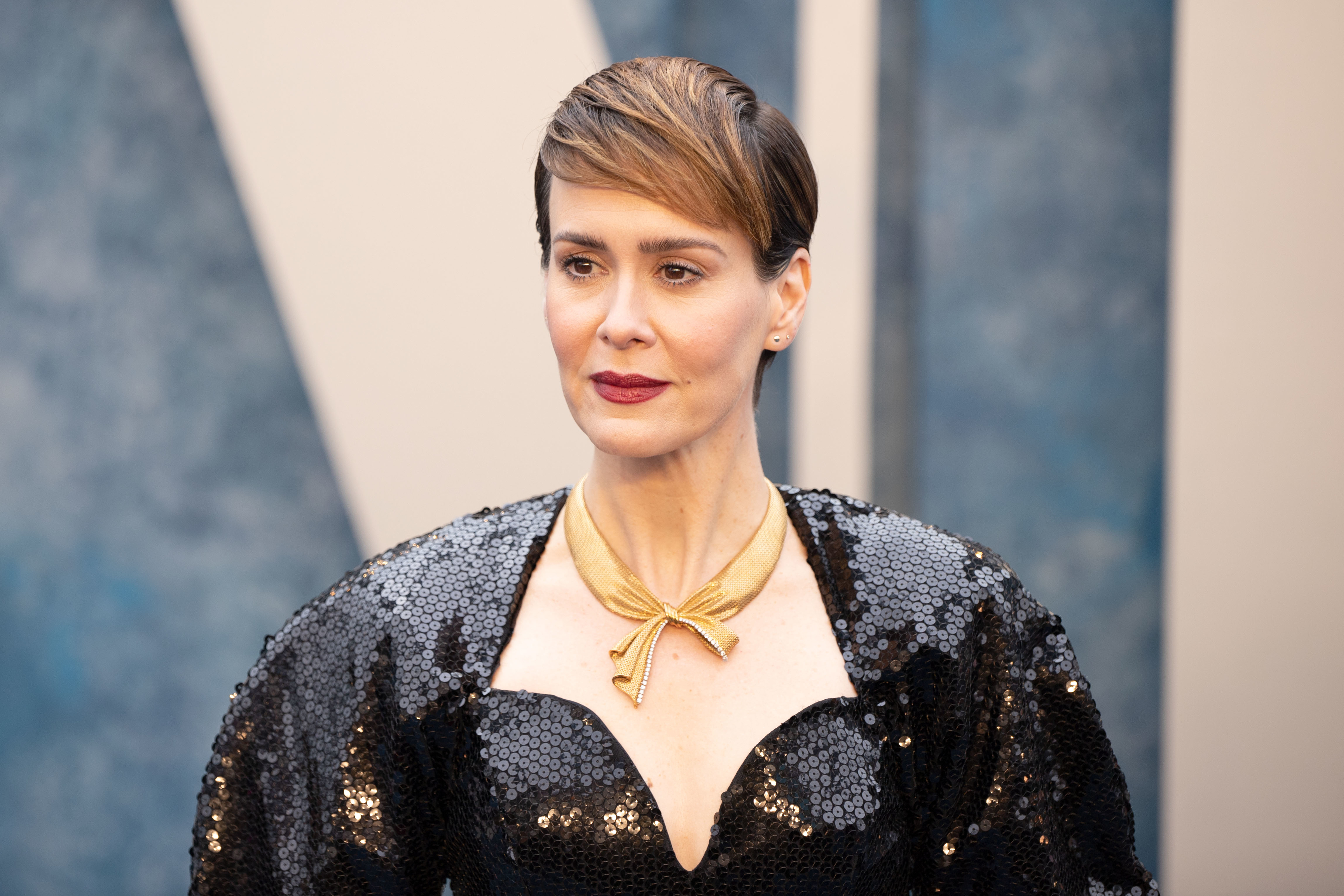Closeup of Sarah Paulson in a sequined outfit