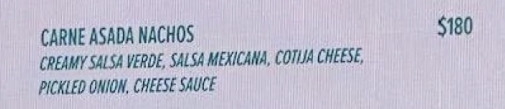 Menu item description: Carne Asada Nachos with various toppings, including creamy salsa verde, and pickled onion priced at $180