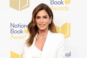 Cindy Crawford poses in a white suit at the National Book Awards event