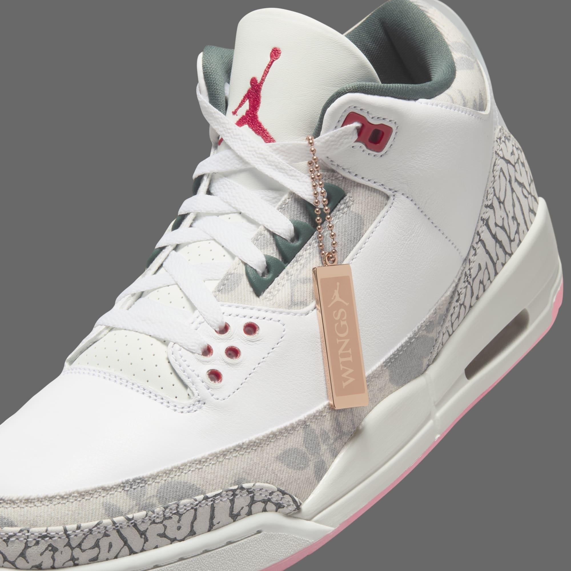 Air Jordan 3 Retro sneaker with &quot;WINGS&quot; tag on white background