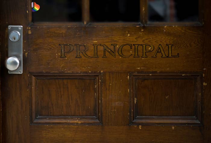 Wooden door with the word "PRINCIPAL" engraved, implying it's the office of a school administrator