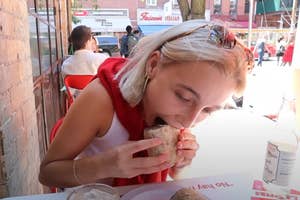 Emma Chamberlain eating a burrito in NYC
