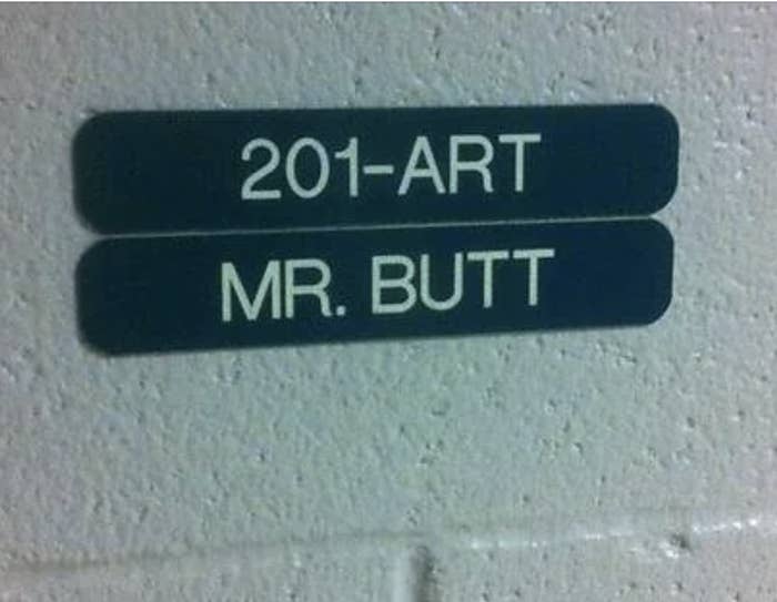 Door sign reading "201-ART MR. BUTT," suggesting a humorous name for a classroom or office