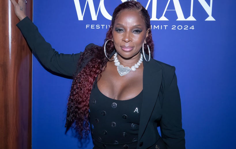 Mary J. Blige poses at an event for Strength of a Woman event
