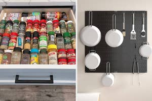 Drawer with organized spice jars next to a wall-mounted kitchen utensil holder with pans, utensils, and cutting boards